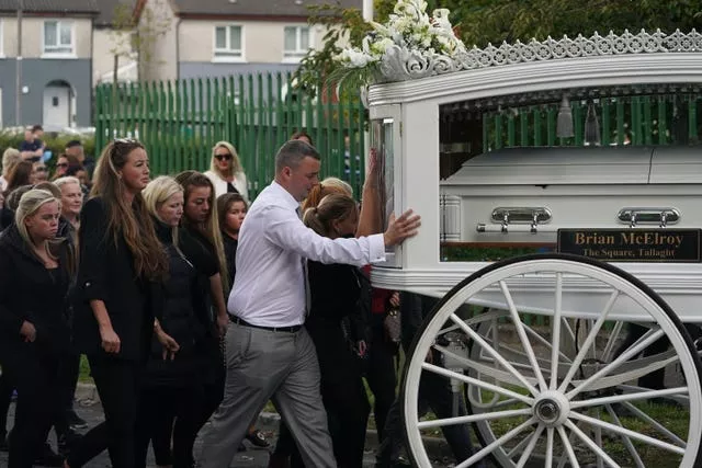 The coffins of Lisa Cash, 18, and her eight-year-old twin siblings, Christy and Chelsea Cawley, arrive at St Aidan’s Church, Brookfield, Tallaght, ahead of their removal service