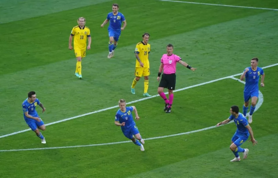 Oleksandr Zinchenko celebrates scoring for Ukraine at Euro 2020 