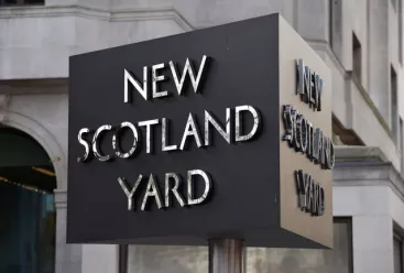 New Scotland Yard sign outside the headquarters of the Metropolitan Police