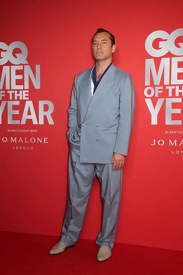 Jude Law attends the GQ Men of the Year photocall at Kensington Roof Gardens