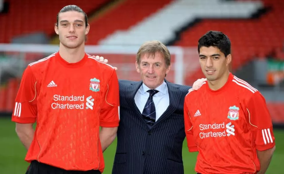 Kenny Dalglish (centre) with Luis Suarez and Andy Carroll 