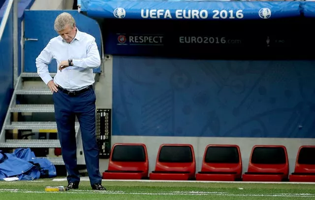 Then England boss Roy Hodgson looks at his watch during a Euro 2016 defeat by Iceland in Nice