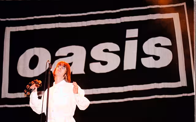 Liam Gallagher of Oasis in concert on stage at Knebworth House
