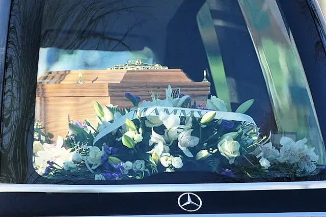 A coffin in a hearse