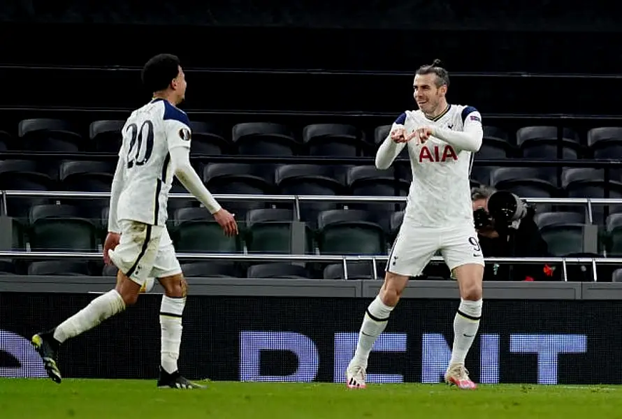 Gareth Bale celebrates his goal with Dele Alli 