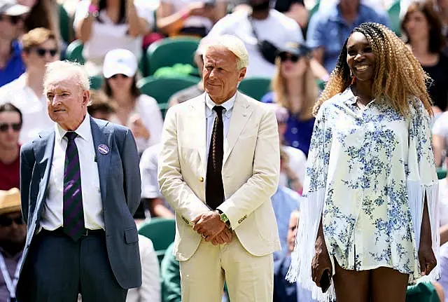 Bjorn Borg, centre, was introduced to the crowd by his great former rival John McEnroe 