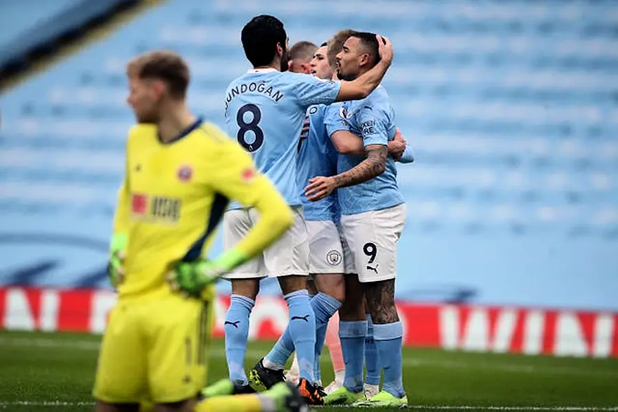 Manchester City players celebrate following Gabriel Jesus' first-half strike