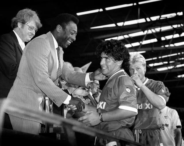 Pele, left, greets Argentina great Diego Maradona at Wembley in August 1987. The Brazilian was a guest of honour for a Football League Centenary Match between a Football League XI and a Rest of the World team