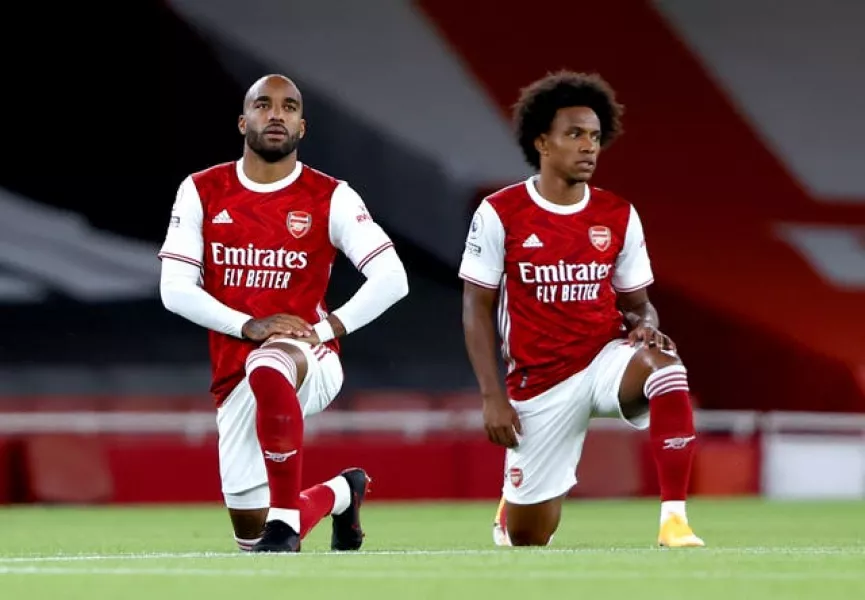 Alexandre Lacazette (left) and Willian were among those who missed the Brentford game due to Covid.