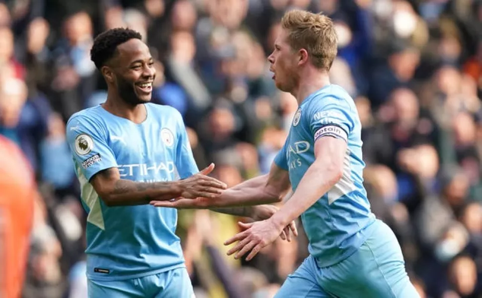 Kevin De Bruyne, right, celebrates his goal with Raheem Sterling 
