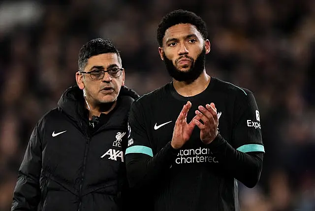 Joe Gomez leaves the field after sustaining a hamstring injury