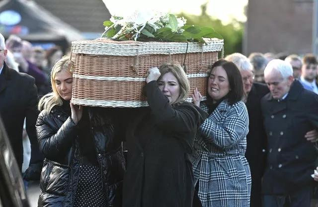 Friends carry the casket of murder victim Natalie McNally following her funeral service at her parents home in Lurgan in Co Armagh, Northern Ireland
