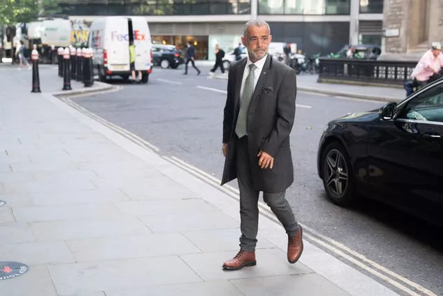 Michael Le Vell arrives at the Rolls Buildings in central London for the phone hacking trial against Mirror Group Newspapers