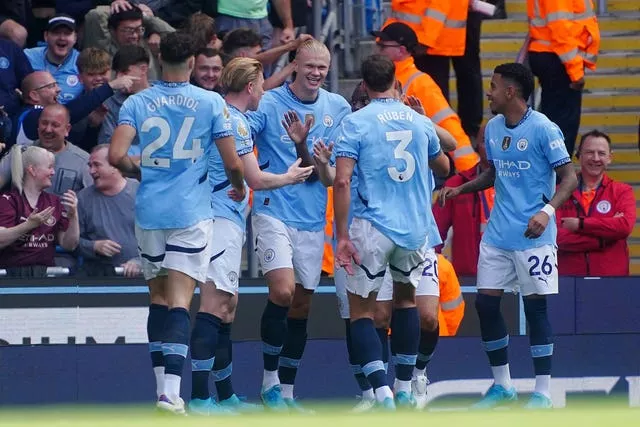 Manchester City’s Erling Haaland (centre) celebrates scoring a goal