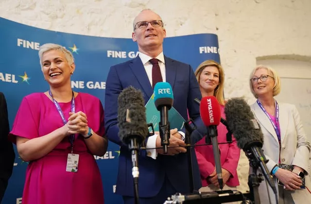 Simon Coveney with Fine Gael European election candidates Nina Carberry (second right), Maria Walsh (left) and Regina Doherty at the 82nd Fine Gael Ard Fheis