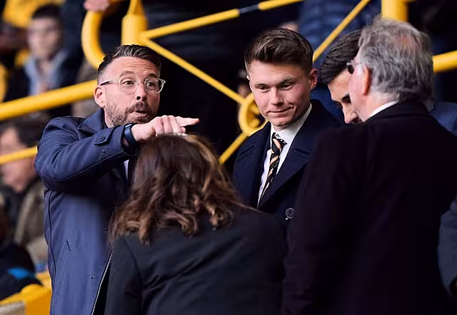 Luton manager Rob Edwards, left, watches on at Molineux