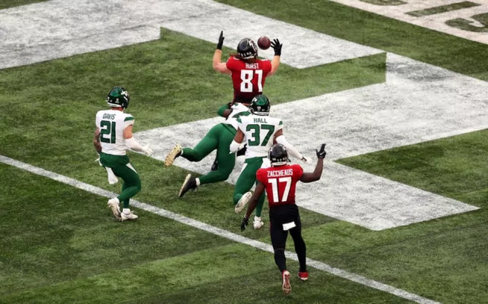 Falcons' Hayden Hurst catches the ball to score his side's second touchdown at the Tottenham Hotspur Stadium