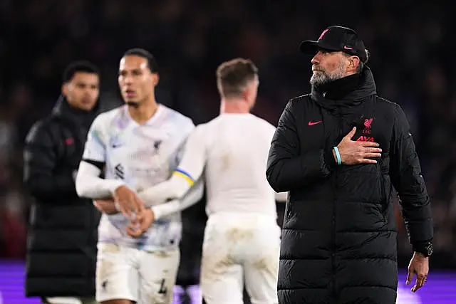 Liverpool manager Jurgen Klopp salutes the fans