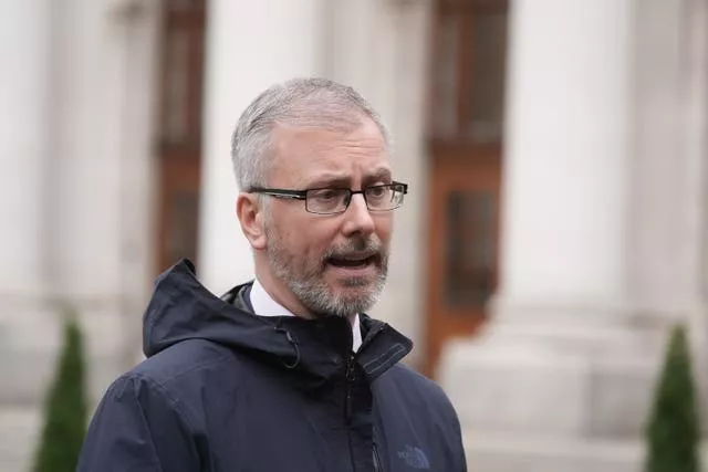 Minister for Children Roderic O’Gorman speaking to the media in the courtyard of the Government Buildings, Dublin