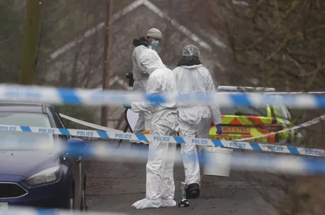 Forensic officers from the Police Service of Northern Ireland (PSNI) at the sports complex in the Killyclogher Road area of Omagh, Co Tyrone