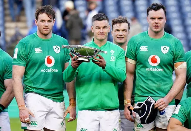 Johnny Sexton, centre, is a relentless taskmaster, according to Cian Healy