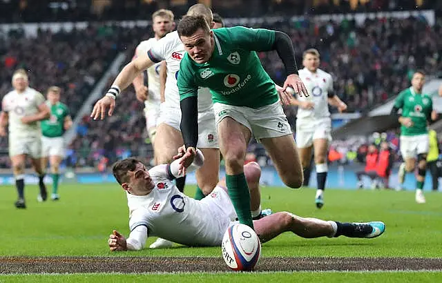 Ireland’s Jacob Stockdale, right, scores against England in the 2018 Six Nations