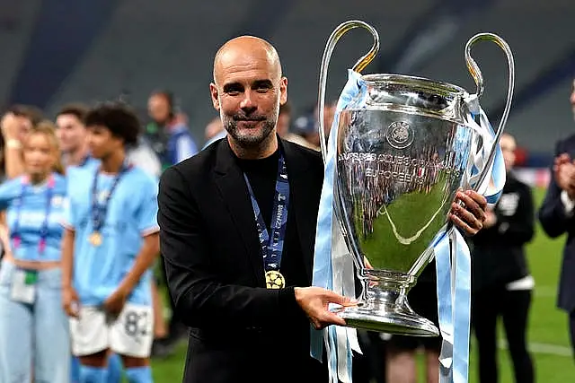 Pep Guardiola holds the European Cup