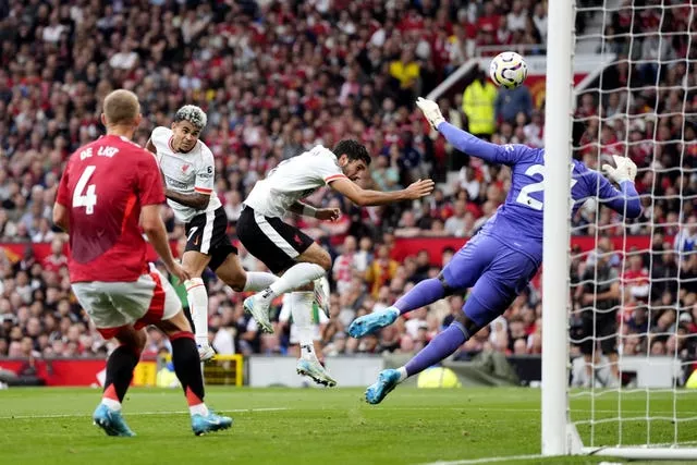 Luis Diaz heads in the first goal as Andre Onana dives