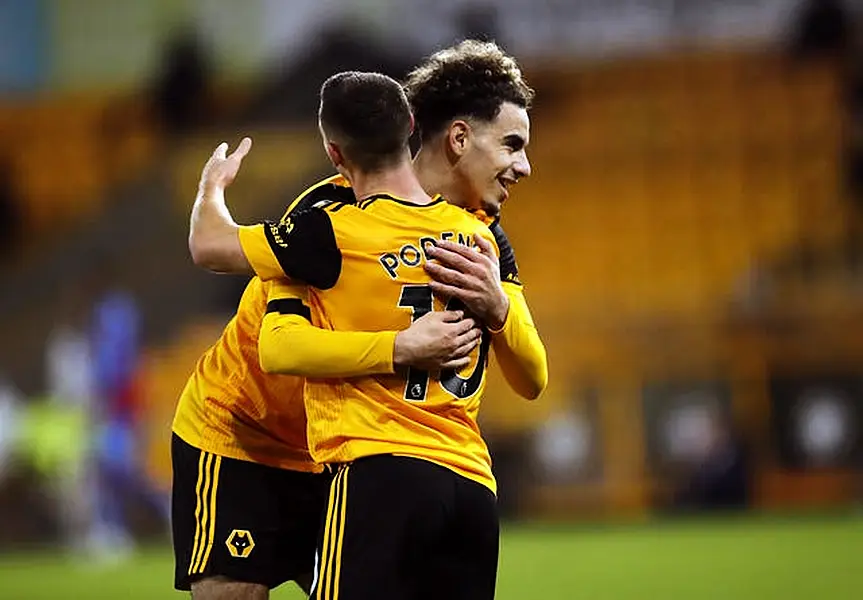 Daniel Podence celebrates his goal with fellow scorer Rayan Ait-Nouri, right