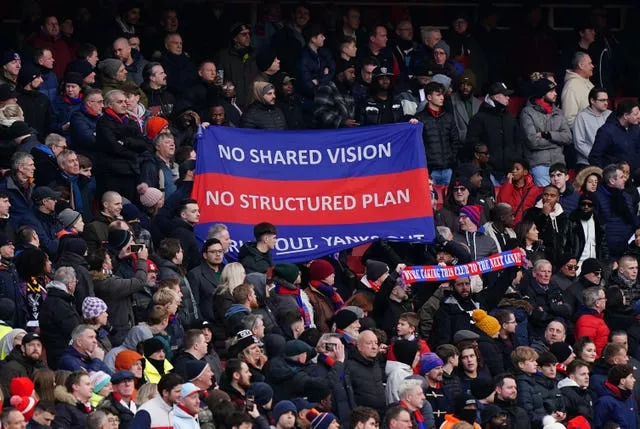 Another banner in the away end at the Emirates Stadium criticised the running of Palace