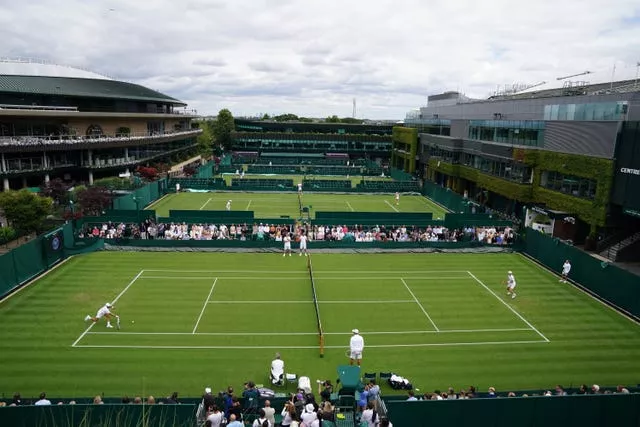 Andy Murray and Novak Djokovic practise at Wimbledon
