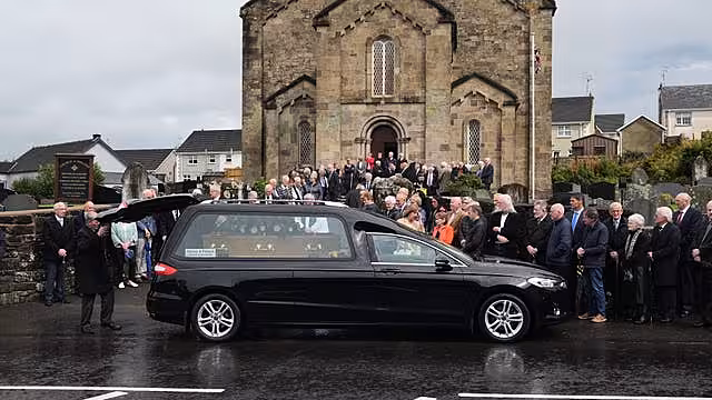 The coffin of country music star Derrick Mehaffey arrives at Donacavey Church of Ireland Parish Church