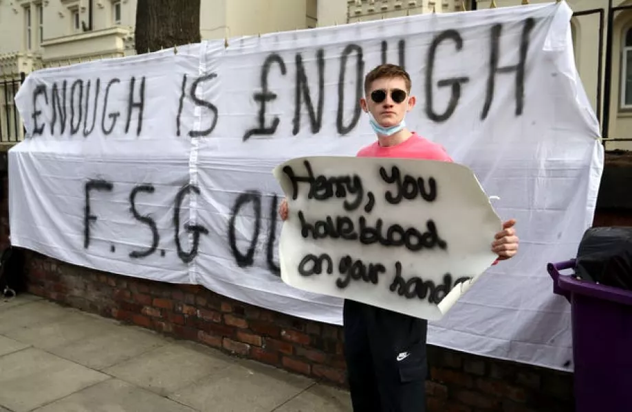 Liverpool fans protest against the clubs owners outside Anfield