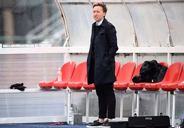 Bev Priestman watching on from the dugout