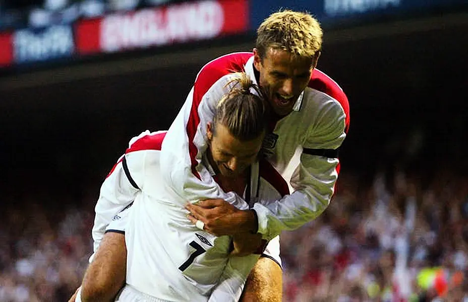 Beckham and Neville are former England and Manchester United team-mates (Andrew Parsons/PA).