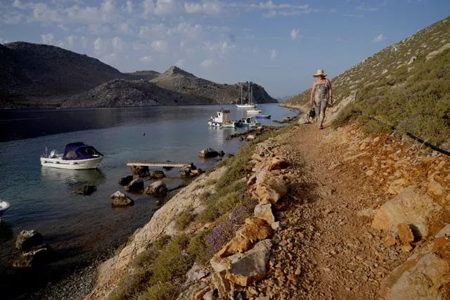 A rocky path near Saint Nikolas Beach in the Pedi district in Symi, Greece, where a search and rescue operation is under way for TV doctor and columnist Michael Mosley after he went missing while on holiday