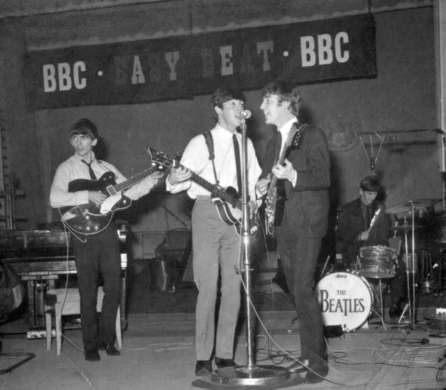 The Beatles on stage in London (PA)