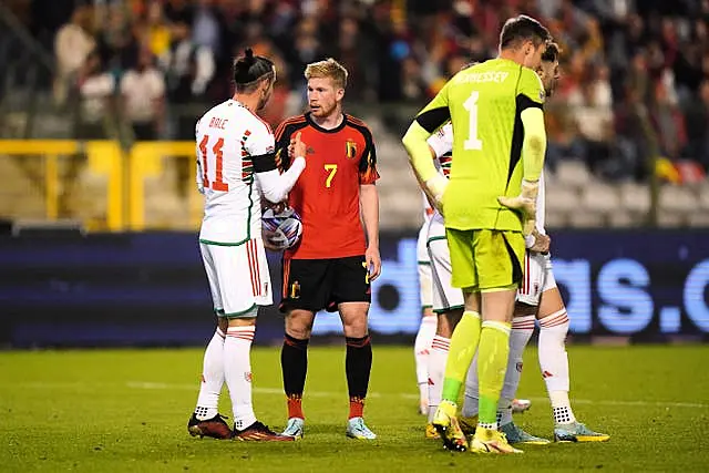 Wales’ Gareth Bale, left, and Belgium’s Kevin De Bruyne in discussion during the match in Brussels