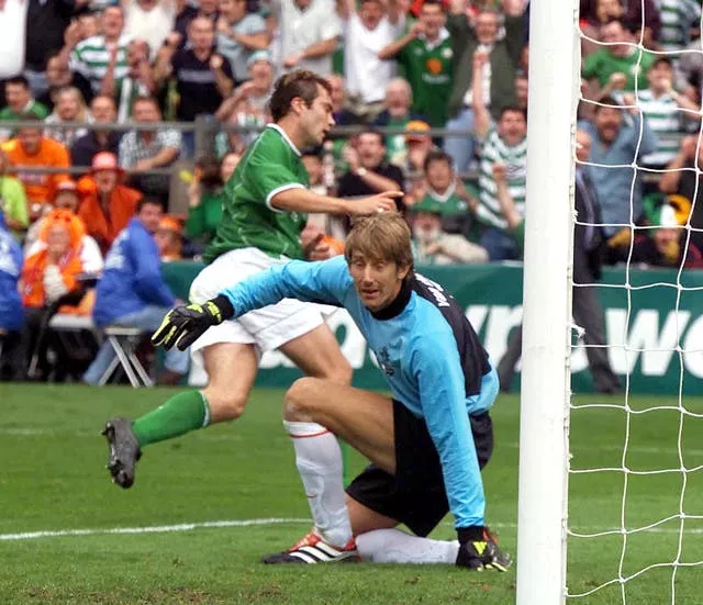 Jason McAteer beats Netherlands keeper Edwin Van der Sar to secure a famous World Cup qualifier victory for the Republic of Ireland