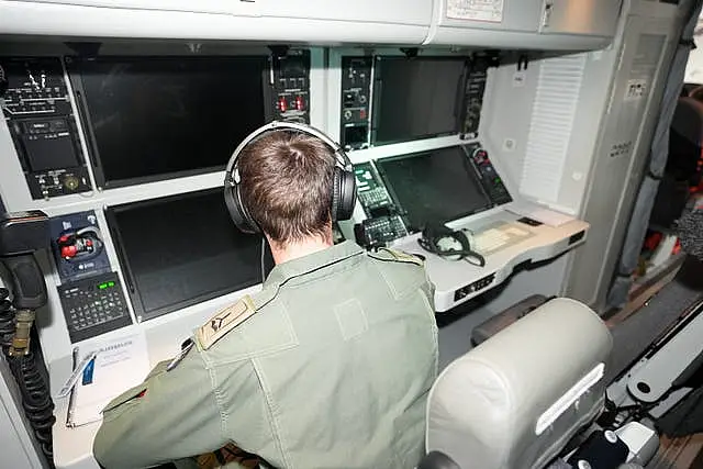 An Air Corps crewman on board a new C295 surveillance aircraft 