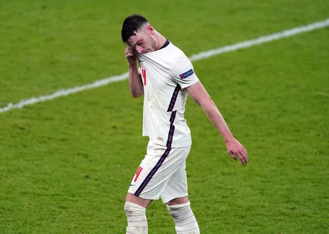 England’s Declan Rice walks off dejected as he is substituted during the Euro 2020 final