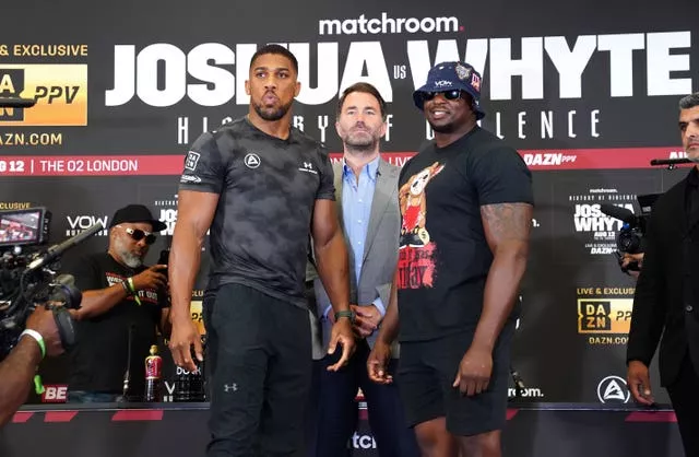Anthony Joshua, promoter Eddie Hearn and Dillian Whyte during a press conference in London 