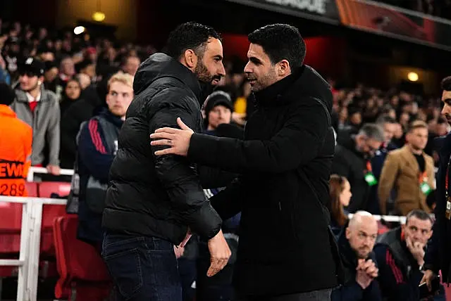 Ruben Amorim, left, greets Mikel Arteta before Sporting Lisbon's Europa League clash with Arsenal in 2023