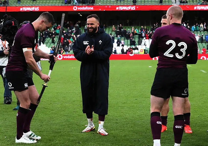 Johnny Sexton with a samurai sword presented to him by the Japan team to mark his 100th cap