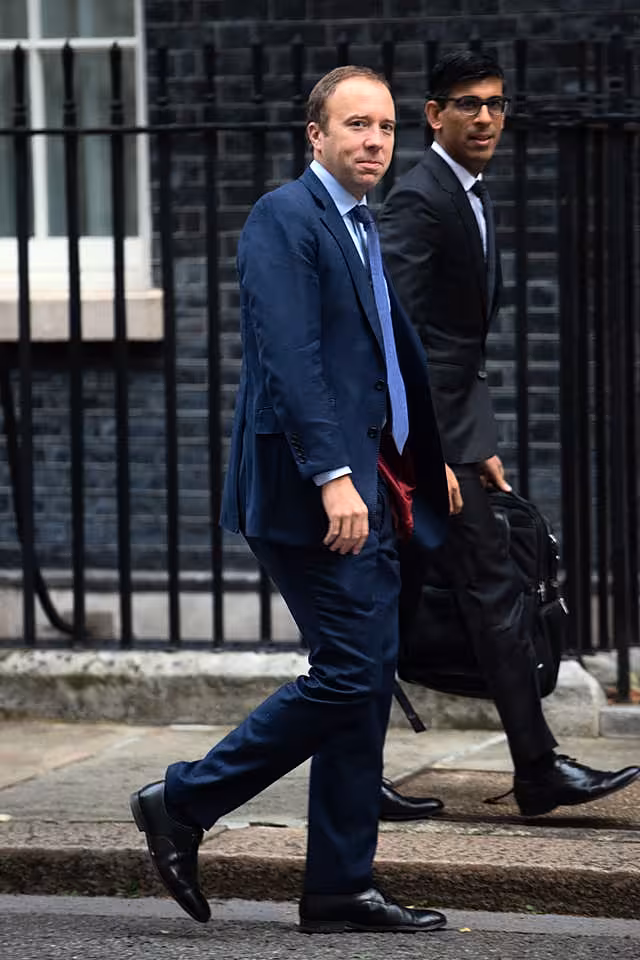 Matt Hancock, left, and Rishi Sunak arriving at No 10