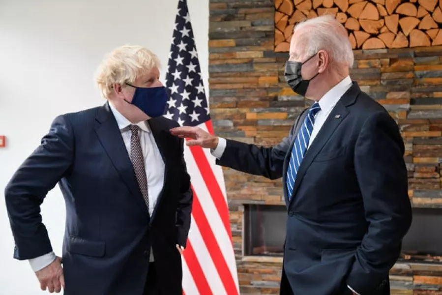 US President Joe Biden (right) talks with Prime Minister Boris Johnson 