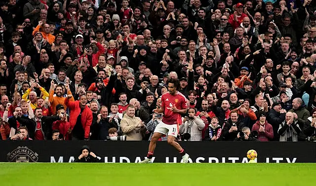 Joshua Zirkzee celebrates scoring his second goal against Everton