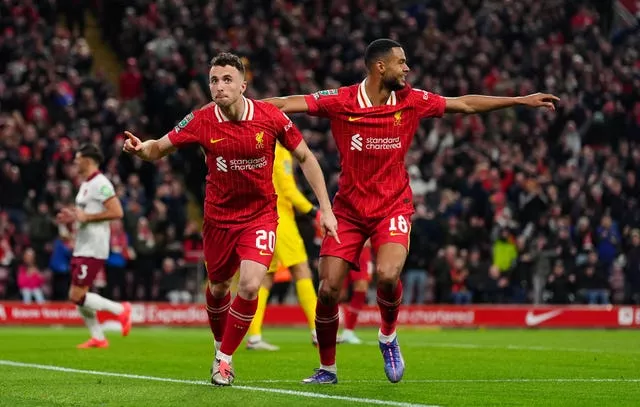 Diogo Jota, left, celebrates scoring for Liverpool