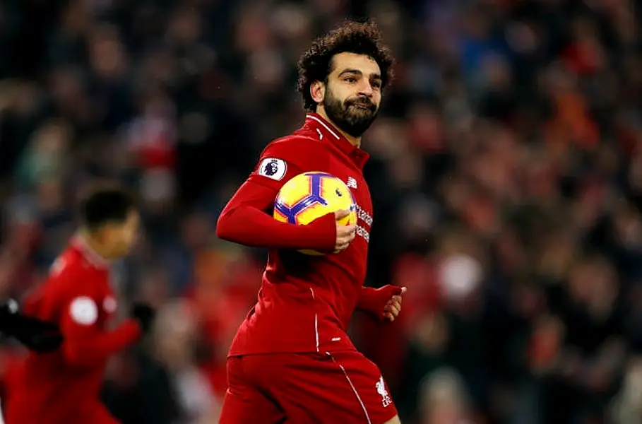 Mohamed Salah celebrates scoring for Liverpool