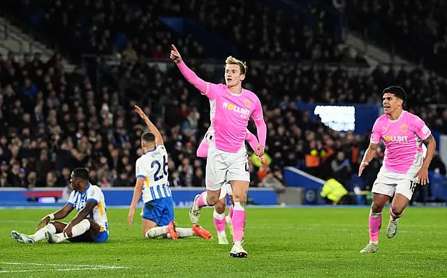 Southampton’s Flynn Downes, centre, celebrates his equaliser against Brighton